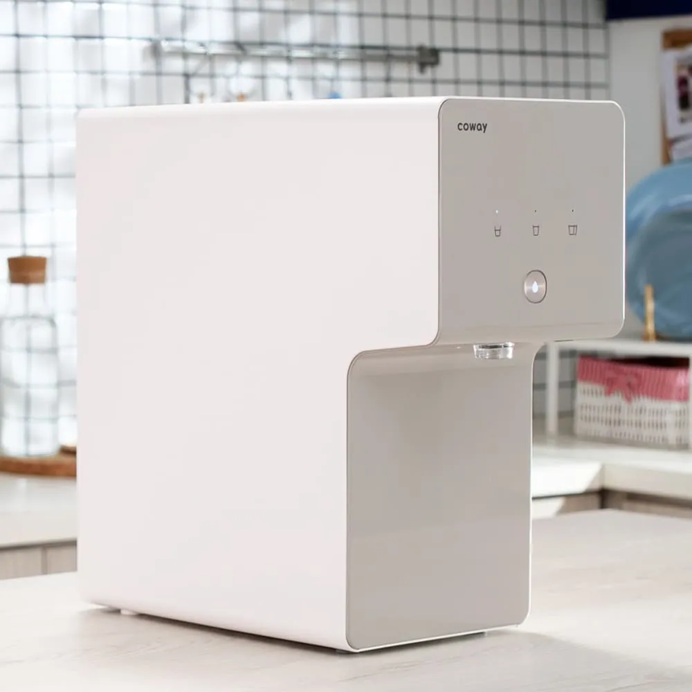 Coway Cinnamon water purifier in a modern kitchen